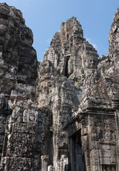 Fototapeta na wymiar Bayon temple with it's face statues in Ankor Wat (Cambodia)