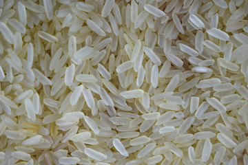 Lot of rice grains stacked together where the the grains are portrait beautifully