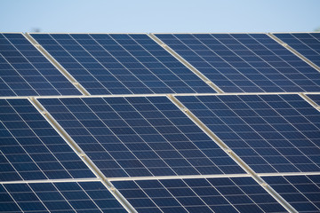 Background or texture of electro plates, solar panels installed on the house. Modern source of electricity.