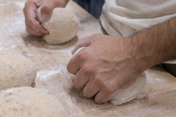 Baker preparing the bread dough