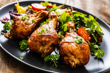 Barbecue chicken drumsticks with roast vegetables