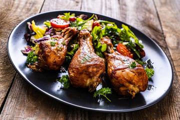 Barbecue chicken drumsticks with roast vegetables