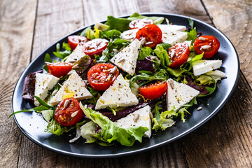 Fresh greek salad - feta cheese, tomato, lettuce, black olives and onion