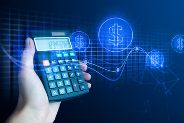 businessman hand holding calculator of digital banking investment financial and payment money concept on black background