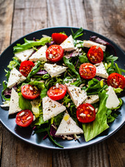 Fresh greek salad - feta cheese, tomato, lettuce, black olives and onion