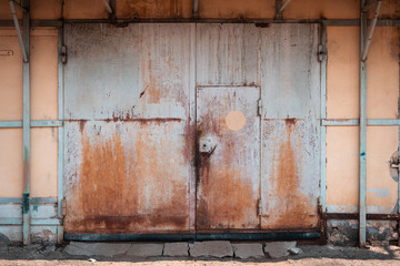 The old grim iron garage door.