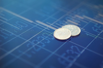 Coins with the inscription "ruble." Volatility of the national currency. Russian money. Exchange rates. Way out of the crisis.