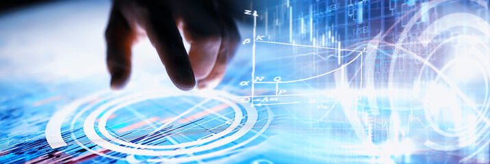 Business concept. Information technology and data processing. Hands over the screen with graphic data. A modern software product in business.