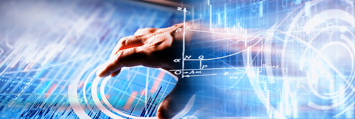 Business concept. Information technology and data processing. Hands over the screen with graphic data. A modern software product in business.