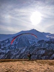 tandem paragliding in the mountains