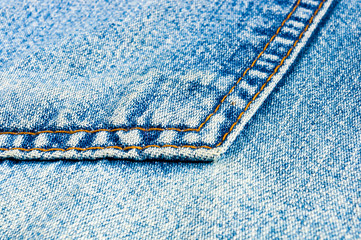 clothing items blue stonewashed faded jeans cotton fabric texture with seams, clasps, buttons and...