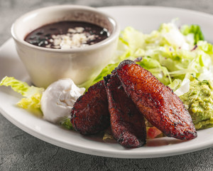 Tasty beautifully plated mexicna plantain meal © Zach