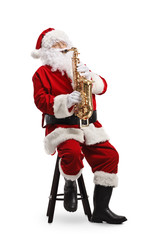 Santa Claus sitting on a chair and playing a saxophone