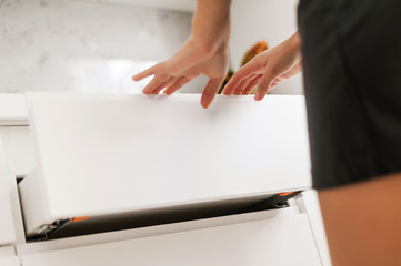 Demonstration of the kitchen. Kitchen cabinets, countertops, cooking areas. Closeup