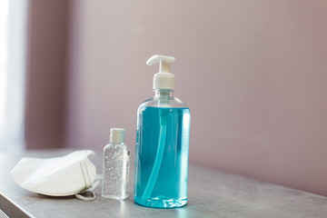 Coronavirus virus prevention Surgical masks and disinfecting blue gels to protect the hands from hand hygiene.