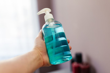 alcohol sprayer or antibacterial soap hand sanitizer from COVID-19