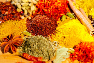 Spices. Various Indian Spices colorful background. Indian Spice and herbs backdrop. Assortment of Seasonings, condiments. Cooking ingredients, flavor
