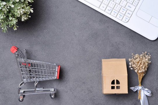 Online shopping Concept. Top view of shopping cart with keyboard for Online shopping. Delivery online shopping. 8