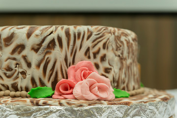 Closeup of marbled birthday cake of white and dark chocolate.