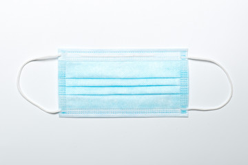 Medical mask for surgery or dentistry. To protect against pathogens and contagious diseases.