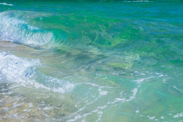 Rising sea waves on the beach
