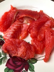 Delicious fresh salmon on a plate macro