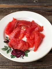 Delicious fresh salmon on a plate macro