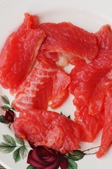 Delicious fresh salmon on a plate macro