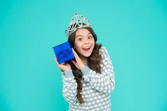 Gifts shop. Shopping day. Birthday surprise. Excited child. Cute smiling little girl with gift box. Kid princess crown. Happy birthday. Birthday princess. Kid crown symbol glory. Happy childrens day
