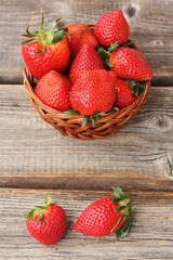 Delicious juicy strawberries on a wooden table