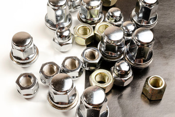 closeup new shiny car nuts and bolts