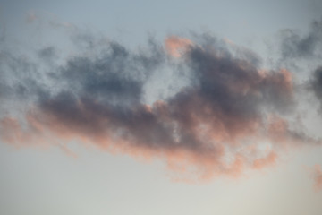 Image of interesting cloud formations with paraglider in summer in the Austrian Alps,