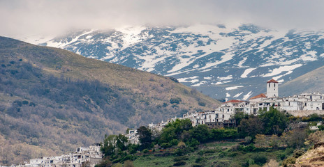 View of Capileira with Sierra Nevada in the background