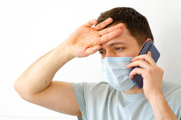 Coronavirus. Quarantine. A man calls a doctor. Fever, cough. Complaint about symptoms.