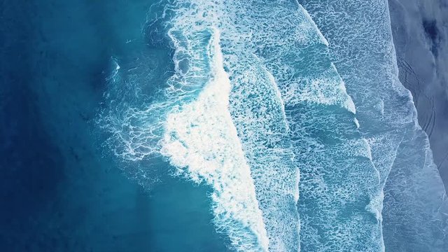 Beautiful ocean waves rolling up on beach