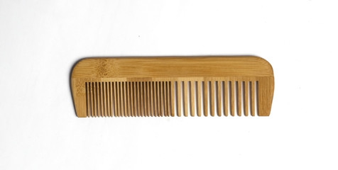 wooden comb on a white background