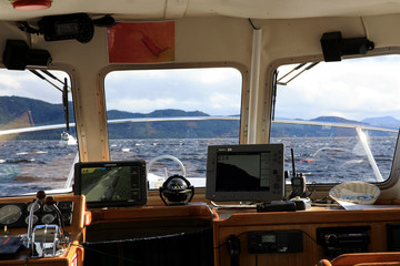 Loch Ness (Scotland), UK - August 02, 2018: Loch Ness lake view from a tourist boat, Scotland,...