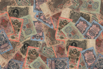 Fototapeta na wymiar Original pattern, background from unique old Russian banknotes, rubles. Currency unit of Imperial Russia. Close-up, high resolution texture