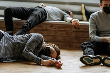everyone on the way to death from coronavirus, people pass out from coronavirus complication, they feel deterioration of health, lie on the floor. coronavirus, death, pneumonia, virus, flu, COVID-19