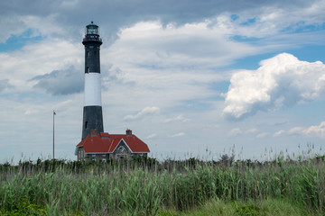 Lighthouse with Clouds and a Pastel Sky