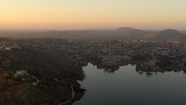 Aerial Helicopter footage of Lake Murray Reservoir in San Diego, California, USA.