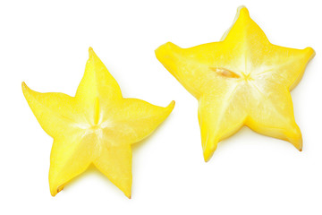 Fototapeta premium slice ripe star fruit carambola or star apple ( starfruit ) on white background. top view