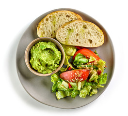 plate of salad and guacamole