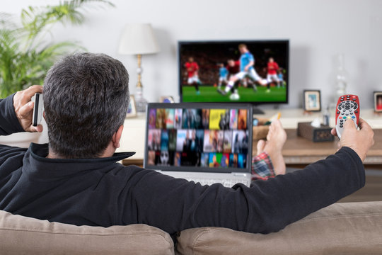 Man Watching Sport On Tv