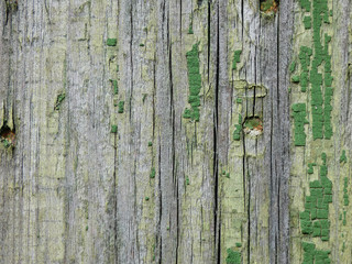 background of old wooden board with peeling paint