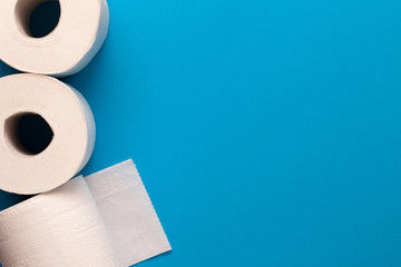 Toilet Paper Rolls On Blue Background