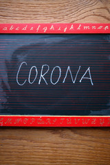 Corona lettering on chalkboard, Health