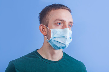 Young man in a medical mask.