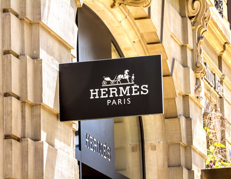 Basel, SWITZERLAND - July 1, 2019: 10 10 2019 : windows door shop sign of Hermes store French manufacturer Herm&egrave;s store