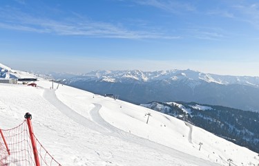 Fototapeta na wymiar winter sports trails on a snowy mountain landscape